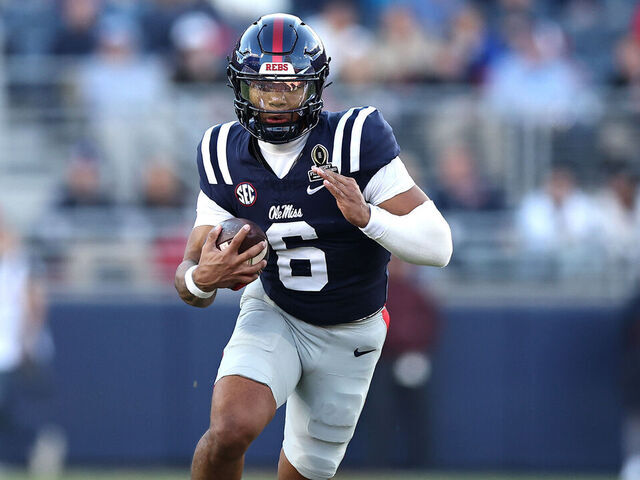 OXFORD, MISSISSIPPI - DECEMBER 20: Trinidad Chambliss #6 of the Ole Miss Rebels rushes for yards during the second quarter of the 2025 College Football Playoff First Round Game against the Tulane Green Wave at Vaught-Hemingway Stadium on December 20, 2025 in Oxford, Mississippi.