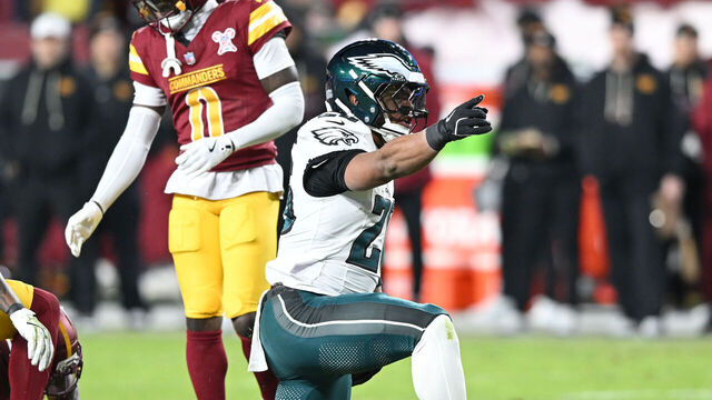 LANDOVER, MARYLAND - DECEMBER 20: Saquon Barkley #26 of the Philadelphia Eagles celebrates a first down against the Washington Commanders during the second quarter at Northwest Stadium on December 20, 2025 in Landover, Maryland.