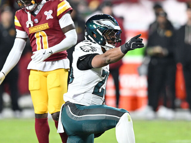 LANDOVER, MARYLAND - DECEMBER 20: Saquon Barkley #26 of the Philadelphia Eagles celebrates a first down against the Washington Commanders during the second quarter at Northwest Stadium on December 20, 2025 in Landover, Maryland.