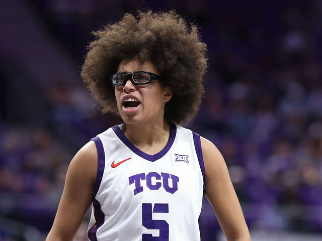 FORT WORTH, TEXAS - DECEMBER 20: Olivia Miles #5 of the TCU Horned Frogs reacts after scoring during the third quarter against the Kansas State Wildcats at Schollmaier Arena on December 20, 2025 in Fort Worth, Texas.