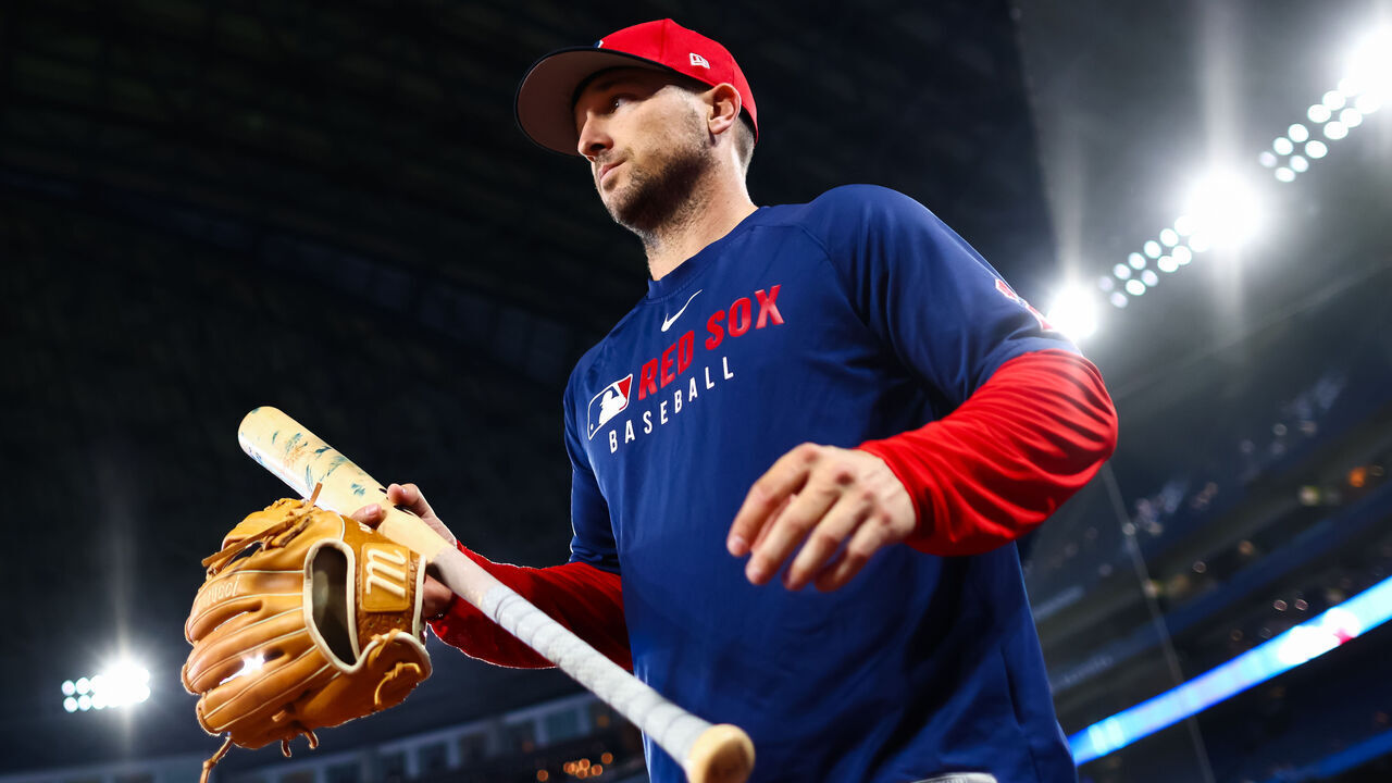 TORONTO, CANADA - APRIL 30: Alex Bregman #2 of the Boston Red Sox takes the field to warm up ahead of their MLB game against the Toronto Blue Jays at Rogers Centre on April 30, 2025 in Toronto, Ontario, Canada.