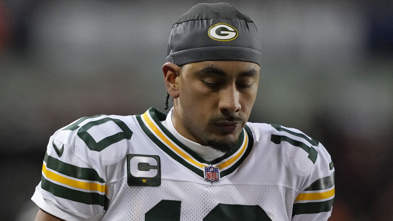 CHICAGO, ILLINOIS - DECEMBER 20: Jordan Love #10 of the Green Bay Packers leaves the field after an apparent injury during the second quarter against the Chicago Bears at Soldier Field on December 20, 2025 in Chicago, Illinois.
