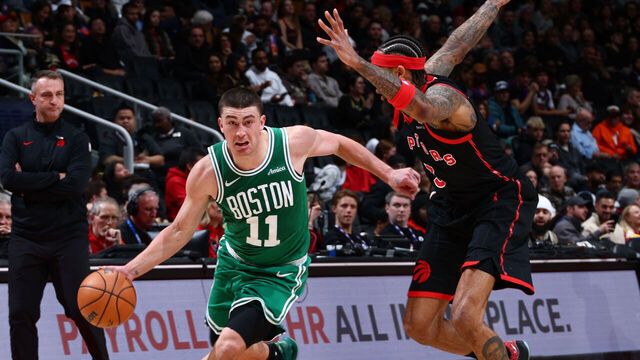 TORONTO, CANADA - DECEMBER 20: Payton Pritchard #11 of the Boston Celtics dribbles the ball during the game against the Toronto Raptors on December 20, 2025 at the Scotiabank Arena in Toronto, Ontario, Canada. Mandatory Copyright Notice: Copyright 2025 NBAE