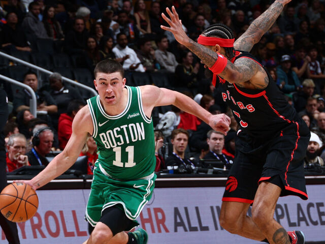TORONTO, CANADA - DECEMBER 20: Payton Pritchard #11 of the Boston Celtics dribbles the ball during the game against the Toronto Raptors on December 20, 2025 at the Scotiabank Arena in Toronto, Ontario, Canada. Mandatory Copyright Notice: Copyright 2025 NBAE