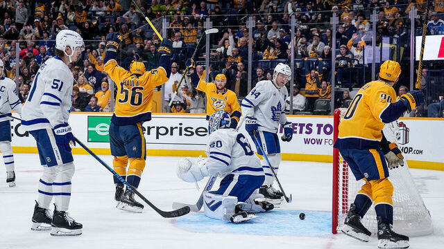 NASHVILLE, TENNESSEE - DECEMBER 20: Erik Haula #56 of the Nashville Predators celebrates his goal against Joseph Woll #60 of the Toronto Maple Leafs during an NHL game at Bridgestone Arena on December 20, 2025 in Nashville, Tennessee.