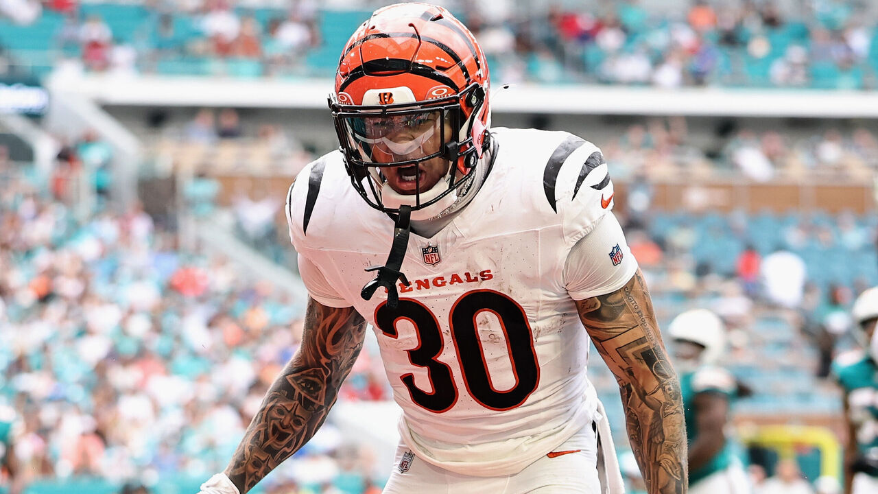 MIAMI GARDENS, FLORIDA - DECEMBER 21: Chase Brown #30 of the Cincinnati Bengals reacts after his touchdown against the Miami Dolphins in the third quarter of a game at Hard Rock Stadium on December 21, 2025 in Miami Gardens, Florida.