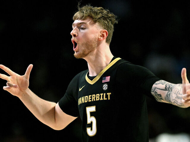 WINSTON SALEM, NORTH CAROLINA - DECEMBER 21: Tyler Nickel #5 of the Vanderbilt Commodores reacts after a three-point basket against the Wake Forest Demon Deacons during the first half of the game at Lawrence Joel Veterans Memorial Coliseum on December 21, 2025 in Winston Salem, North Carolina.
