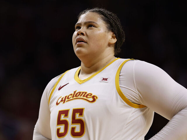 AMES, IA - DECEMBER 10: Center Audi Crooks #55 of the Iowa State Cyclones looks to the game clock in the first half of play at Hilton Coliseum on December 10, 2025, in Ames, Iowa. The Iowa State Cyclones won 74-69 over the Iowa Hawkeyes.