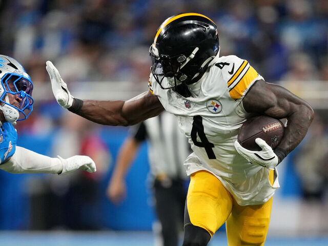 Steelers' Metcalf swings at Lions fan in stands | theScore.com