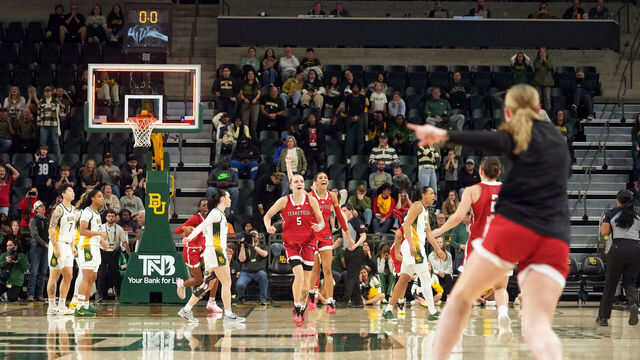 WACO, TEXAS - DECEMBER 21: Texas Tech Lady Raiders react after an upset victory over the Baylor Bears at Foster Pavilion on December 21, 2025 in Waco, Texas.