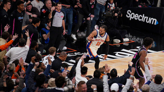 NEW YORK, NEW YORK - DECEMBER 21: Jalen Brunson #11 of the New York Knicks reacts after his made three-point basket against the Miami Heat in the second half at Madison Square Garden on December 21, 2025 in New York City.