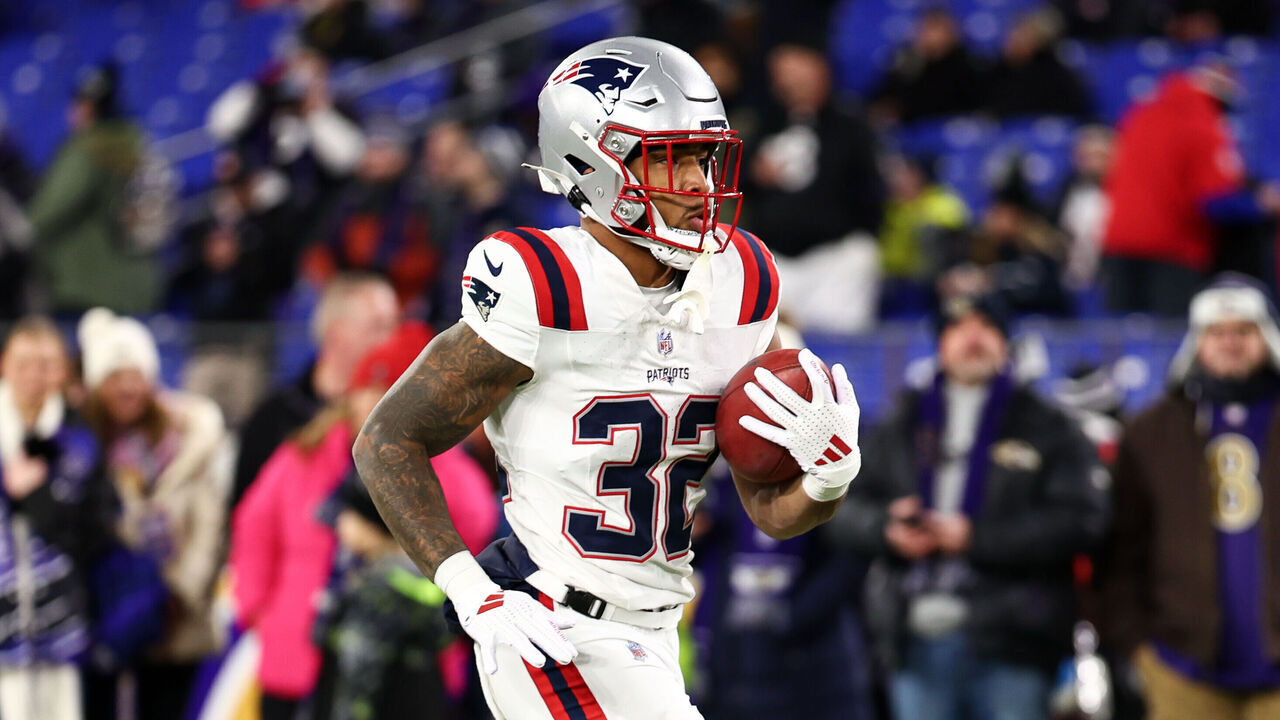 BALTIMORE, MARYLAND - DECEMBER 21: TreVeyon Henderson #32 of the New England Patriots warms up prior to the game against the Baltimore Ravens at M&T Bank Stadium on December 21, 2025 in Baltimore, Maryland.