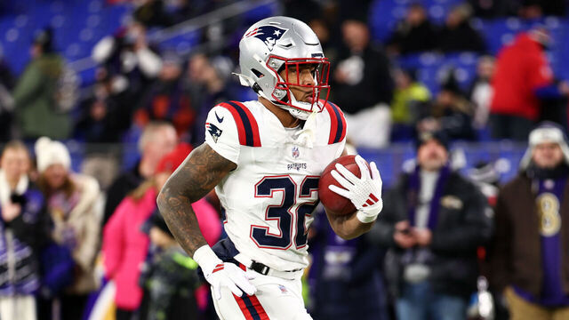 BALTIMORE, MARYLAND - DECEMBER 21: TreVeyon Henderson #32 of the New England Patriots warms up prior to the game against the Baltimore Ravens at M&T Bank Stadium on December 21, 2025 in Baltimore, Maryland.