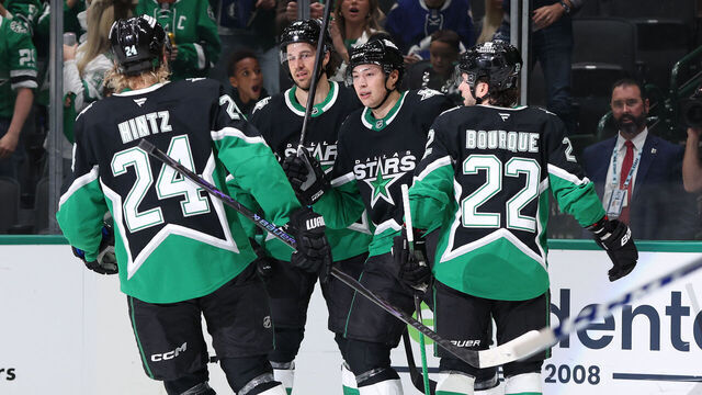DALLAS, TEXAS - DECEMBER 21: Jason Robertson #21 of the Dallas Stars celebrates with Roope Hintz #24, Alexander Petrovic #28, and Mavrik Bourque #22 after scoring a goal during the first period against the Toronto Maple Leafs at American Airlines Center on December 21, 2025 in Dallas, Texas.