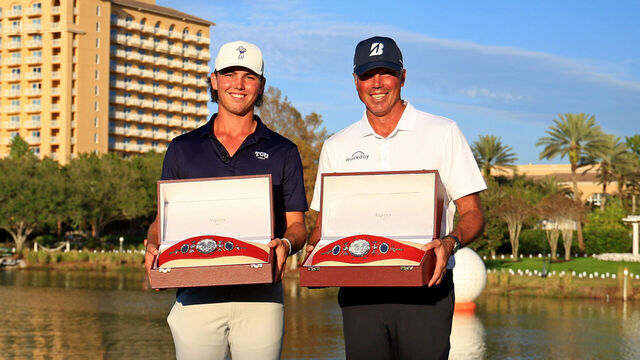 ORLANDO, FLORIDA - DECEMBER 21: Cameron Kuchar and Matt Kuchar pose with the Willie Park Belts after winning the PNC Championship 2025 at Ritz-Carlton Golf Club on December 21, 2025 in Orlando, Florida.