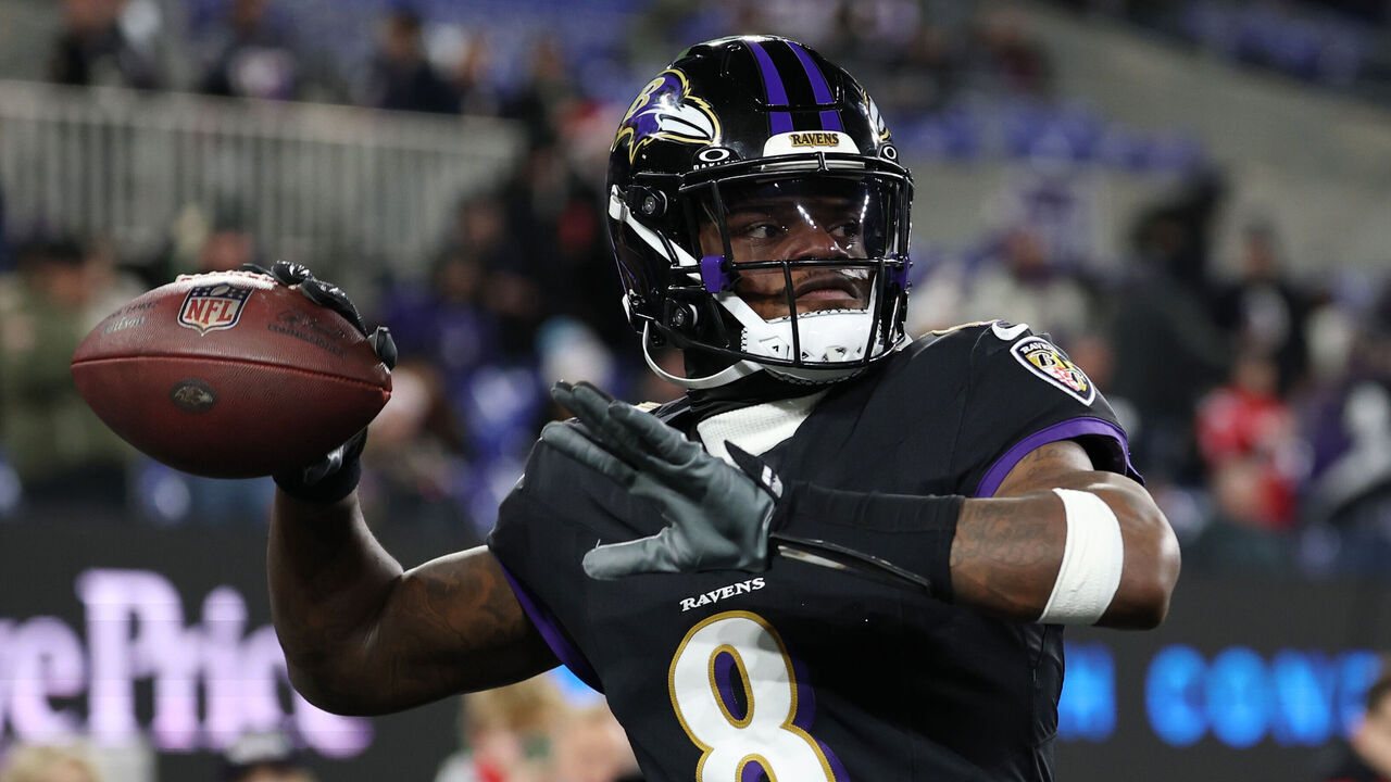 BALTIMORE, MARYLAND - DECEMBER 21: Lamar Jackson #8 of the Baltimore Ravens warms up before the game against the New England Patriots at M&T Bank Stadium on December 21, 2025 in Baltimore, Maryland.
