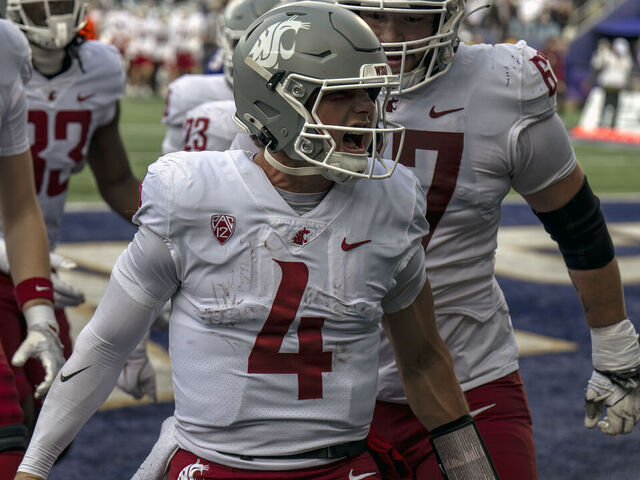 HARRISONBURG, VIRGINIA - NOVEMBER 22: Zevi Eckhaus #4 of Washington State Cougars celebrates after scoring a touchdown in the third quarter during a game against James Madison Dukes at Bridgeforth Stadium on November 22, 2025 in Harrisonburg, Virginia.