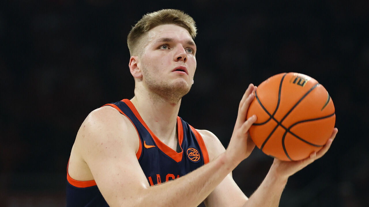 AUSTIN, TX - DECEMBER 03: Forward Thijs de Ridder #28 of the Virginia Cavaliers takes a free throw during the college basketball game between Texas Longhorns and Virginia Cavaliers on December 3, 2025, at Moody Center in Austin, TX.