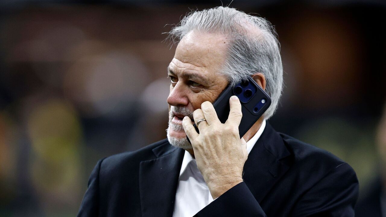 NEW ORLEANS, LOUISIANA - NOVEMBER 23: Mickey Loomisexecutive vice president and general manager of the New Orleans Saints stands on the field during an NFL game against the Atlanta Falcons at Caesars Superdome on November 23, 2025 in New Orleans, Louisiana.