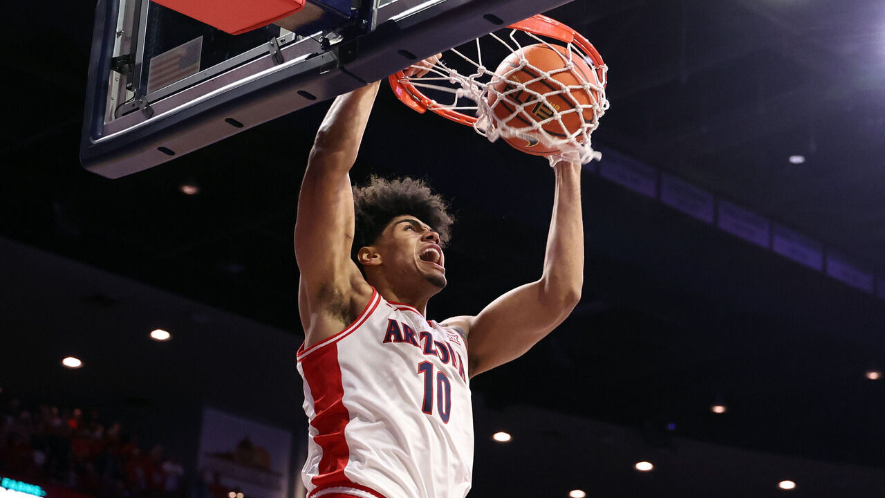 TUCSON, ARIZONA - DECEMBER 22: Koa Peat #10 of the Arizona Wildcats dunks the ball during the first half against the Bethune-Cookman Wildcats at McKale Center on December 22, 2025 in Tucson, Arizona.