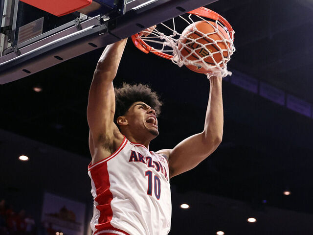 TUCSON, ARIZONA - DECEMBER 22: Koa Peat #10 of the Arizona Wildcats dunks the ball during the first half against the Bethune-Cookman Wildcats at McKale Center on December 22, 2025 in Tucson, Arizona.