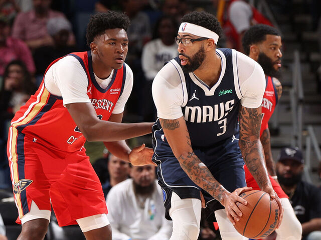 NEW ORLEANS, LA - DECEMBER 22: Derik Queen #22 of the New Orleans Pelicans plays defense during the game against Anthony Davis #3 of the Dallas Mavericks on December 22, 2025 at the Smoothie King Center in New Orleans, Louisiana. Mandatory Copyright Notice: Copyright 2025 NBAE