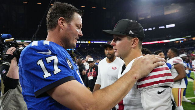 INDIANAPOLIS, INDIANA - DECEMBER 22: Philip Rivers #17 of the Indianapolis Colts and Brock Purdy #13 of the San Francisco 49ers shake hands after the game at Lucas Oil Stadium on December 22, 2025 in Indianapolis, Indiana.