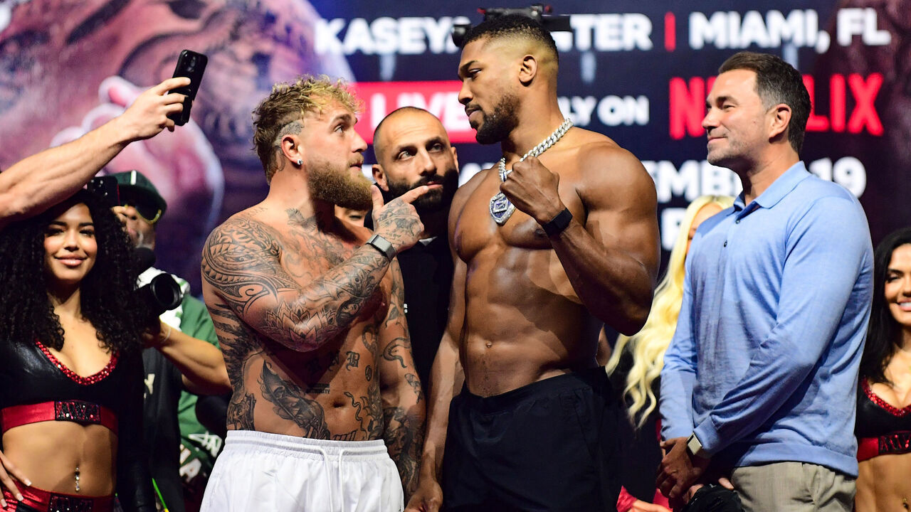 Jake Paul and Anthony Joshua during a public weigh-in at the Fillmore Miami Beach, Florida. Anthony Joshua will take on YouTuber-turned-boxer Jake Paul in a heavyweight bout in Miami on December 19. Picture date: Thursday December 18, 2025.