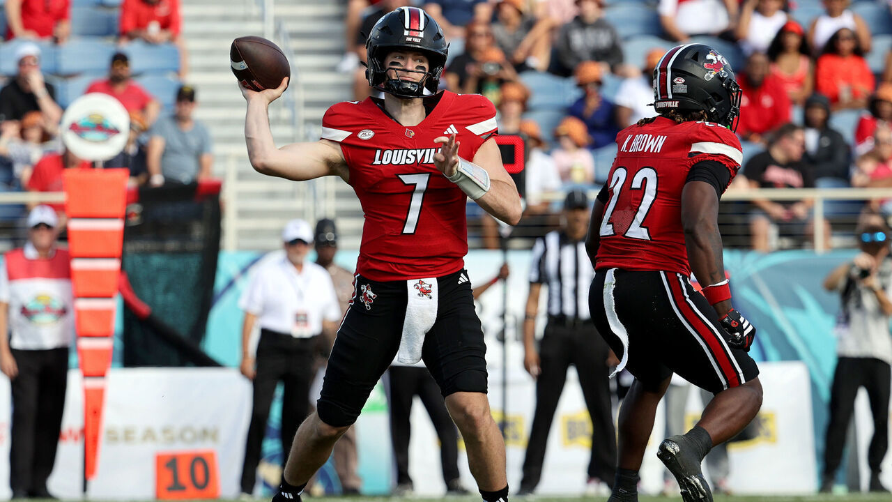 BOCA RATON, FLORIDA - DECEMBER 23: Miller Moss #7 of the Louisville Cardinals passes the ball against the Toledo Rockets during the first half of the 2025 Bush's Boca Raton Bowl of Beans game at Flagler Credit Union Stadium on December 23, 2025 in Boca Raton, Florida.