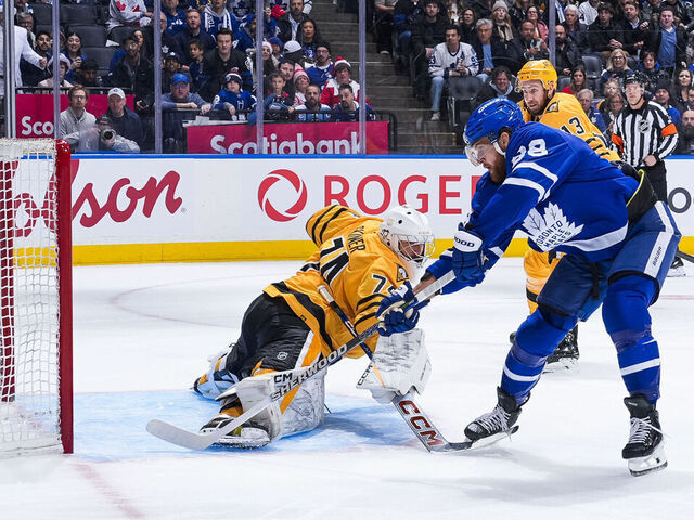 TORONTO, CANADA - DECEMBER 23: William Nylander #88 of the Toronto Maple Leafs scores a goal against Stuart Skinner #74 of the Pittsburgh Penguins during the first period at the Scotiabank Arena on December 23, 2025 in Toronto, Ontario, Canada.