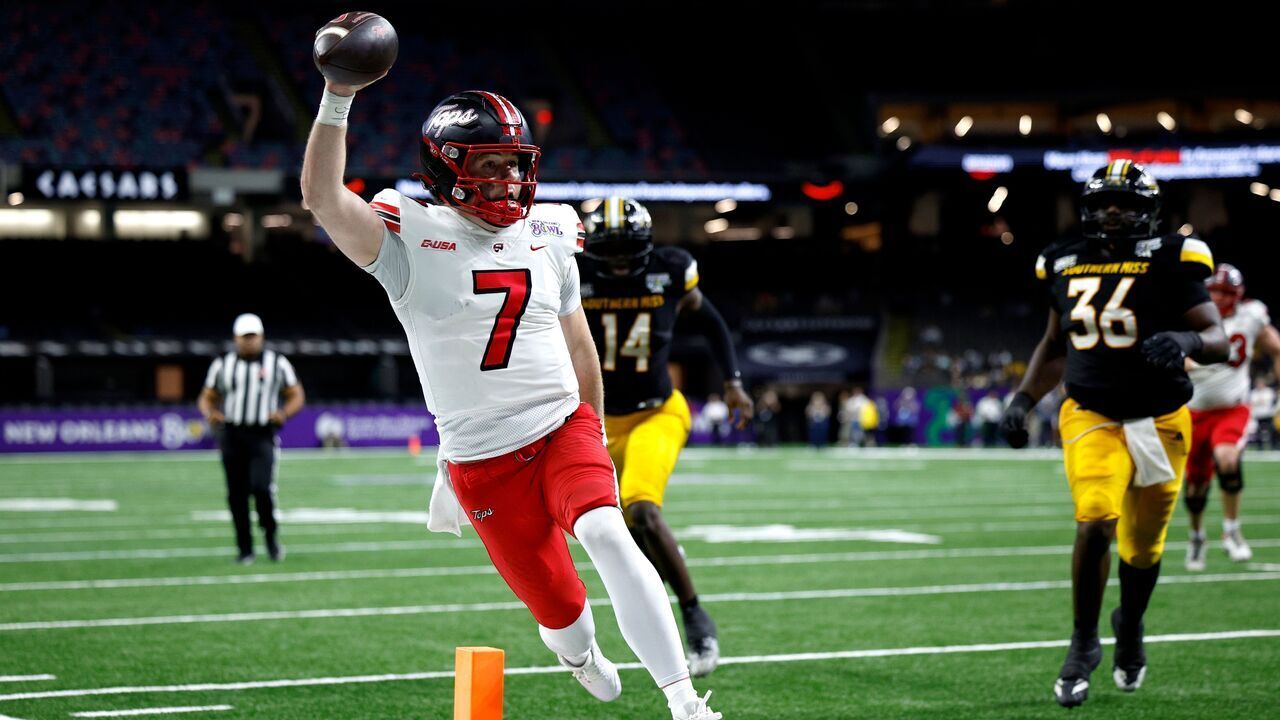 NEW ORLEANS, LOUISIANA - DECEMBER 23: Maverick McIvor #7 of the Western Kentucky Hilltoppers scores a touchdown during the third quarter of the R+L Carriers New Orleans Bowl against the Southern Mississippi Golden Eagles at Caesars Superdome on December 23, 2025 in New Orleans, Louisiana.
