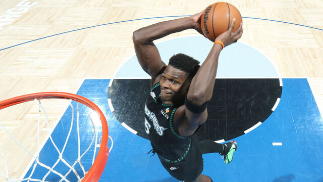 MINNEAPOLIS, MN - DECEMBER 23: Anthony Edwards #5 of the Minnesota Timberwolves drives to the basket during the game against the New York Knicks on December 23, 2025 at Target Center in Minneapolis, Minnesota. Mandatory Copyright Notice: Copyright 2025 NBAE