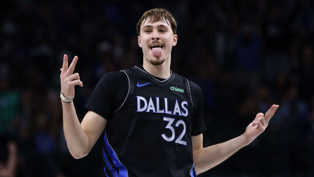 DALLAS, TEXAS - DECEMBER 23: Cooper Flagg #32 of the Dallas Mavericks reacts after scoring a three point basket during the second half against the Denver Nuggets at American Airlines Center on December 23, 2025 in Dallas, Texas.