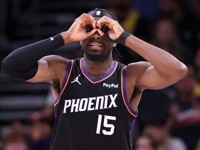 PHOENIX, ARIZONA - DECEMBER 23: Mark Williams #15 of the Phoenix Suns celebrates after dunking the ball during the first half against the Los Angeles Lakers at Mortgage Matchup Center on December 23, 2025 in Phoenix, Arizona.