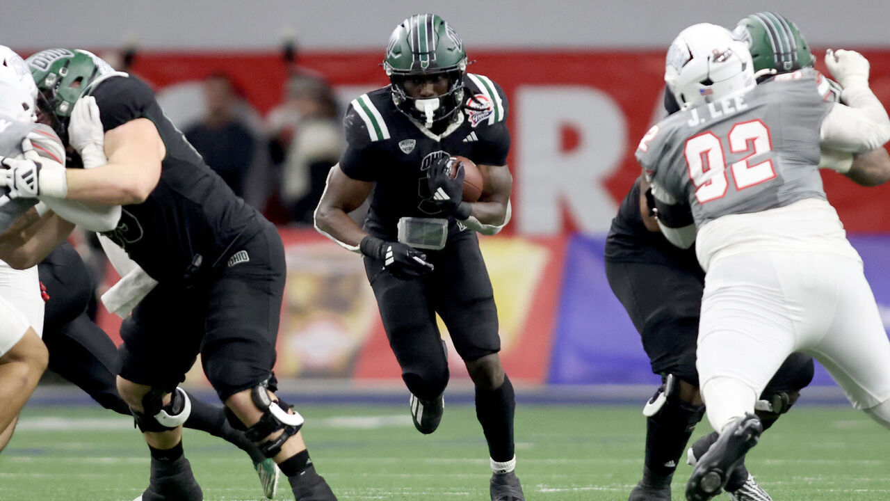 FRISCO, TEXAS - DECEMBER 23: Sieh Bangura #5 of the Ohio Bobcats runs the ball against the UNLV Rebels during the second quarter during the Scooter's Coffee Frisco Bowl at Ford Center on December 23, 2025 in Frisco, Texas.