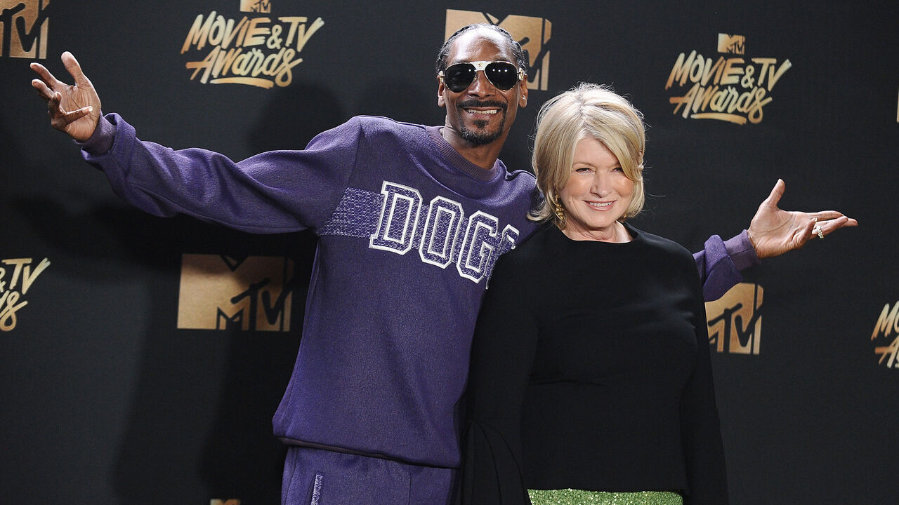 LOS ANGELES, CA - MAY 07: Snoop Dogg and Martha Stewart pose in the press room at the 2017 MTV Movie and TV Awards at The Shrine Auditorium on May 7, 2017 in Los Angeles, California.