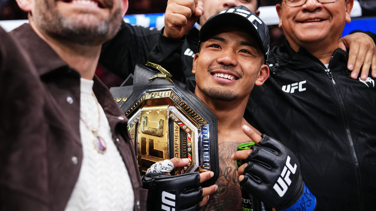 LAS VEGAS, NEVADA - DECEMBER 06:Joshua Van of Myanmar reacts to his TKO win in the UFC flyweight championship fight during the UFC 323 event at T-Mobile Arena on December 06, 2025 in Las Vegas, Nevada.