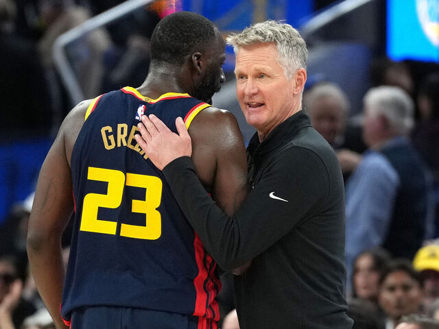 SAN FRANCISCO, CALIFORNIA - MARCH 13: Head coach Steve Kerr of the Golden State Warriors talks with his player Draymond Green #23 during a break in the action against the Sacramento Kings in the fourth quarter at Chase Center on March 13, 2025 in San Francisco, California.