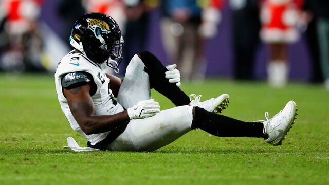 DENVER, CO - DECEMBER 21: Jourdan Lewis #2 of the Jacksonville Jaguars reacts after injuring himself during the fourth quarter against the Denver Broncos at Empower Field at Mile High on December 21, 2025 in Denver, Colorado.