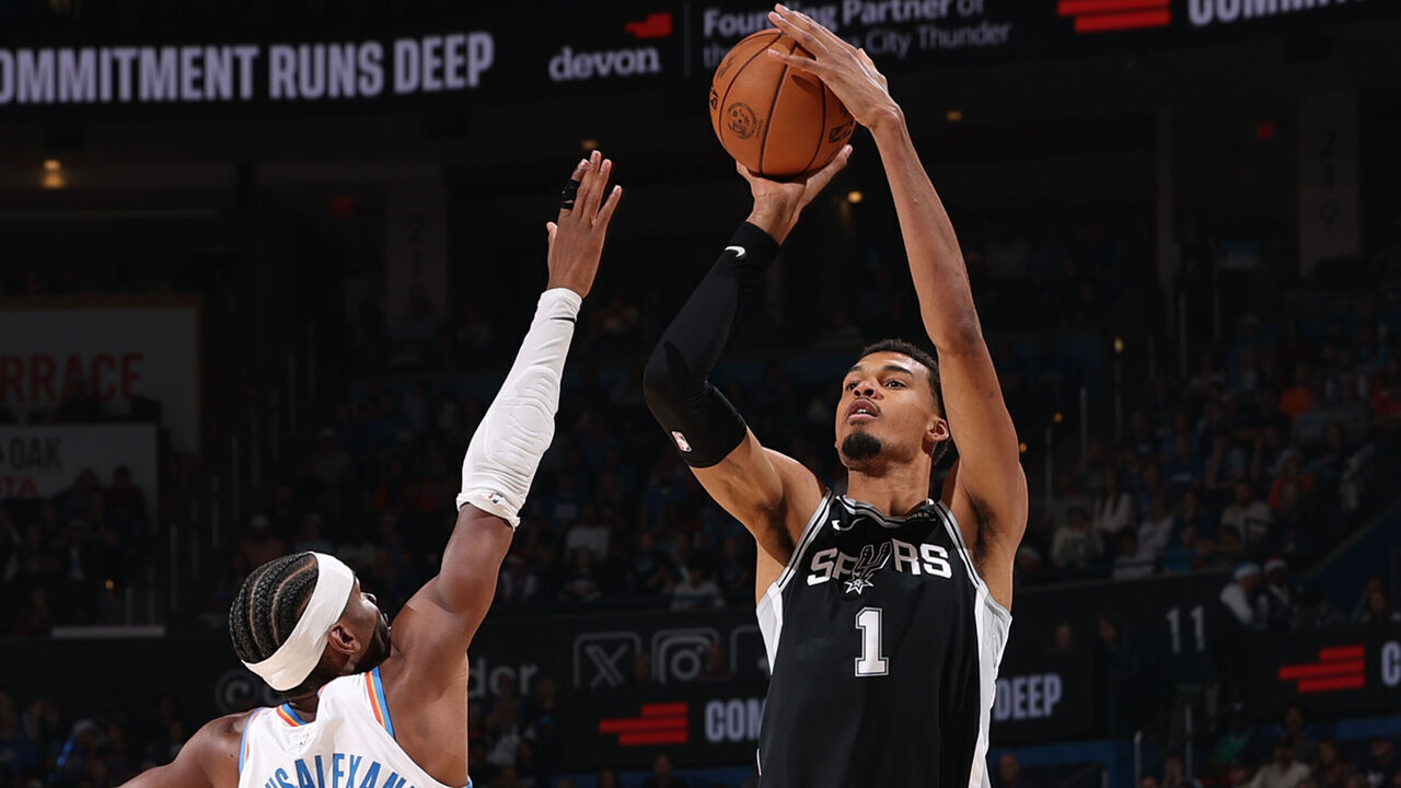 OKLAHOMA CITY, OK - DECEMBER 25: Shai Gilgeous-Alexander #2 of the Oklahoma City Thunder plays defense during the game against Victor Wembanyama #1 of the San Antonio Spurs on December 25, 2025 at Paycom Center in Oklahoma City, Oklahoma. Mandatory Copyright Notice: Copyright 2025 NBAE