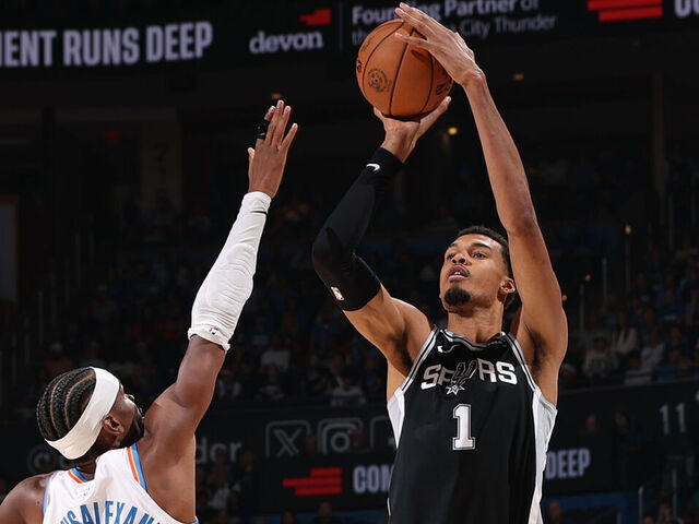 OKLAHOMA CITY, OK - DECEMBER 25: Shai Gilgeous-Alexander #2 of the Oklahoma City Thunder plays defense during the game against Victor Wembanyama #1 of the San Antonio Spurs on December 25, 2025 at Paycom Center in Oklahoma City, Oklahoma. Mandatory Copyright Notice: Copyright 2025 NBAE
