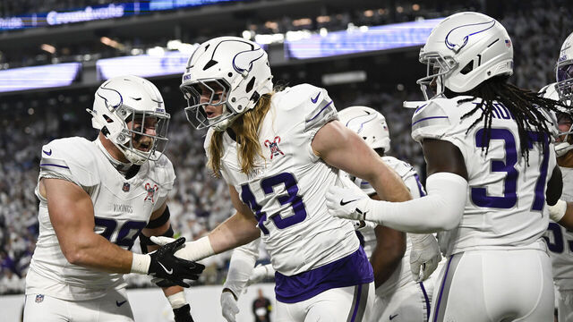 MINNEAPOLIS, MINNESOTA - DECEMBER 25: Andrew van Ginkel #43 of the Minnesota Vikings is congratulated by his teammates after recovring a fumble against the Detroit Lions during the first quarter at U.S. Bank Stadium on December 25, 2025 in Minneapolis, Minnesota.
