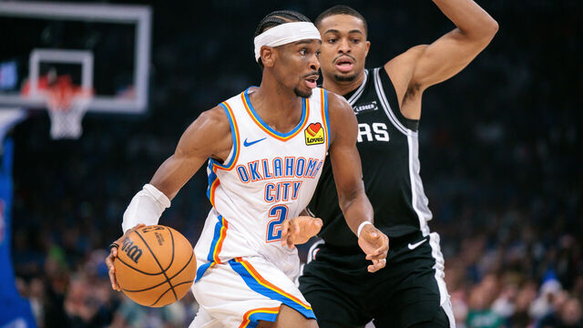 OKLAHOMA CITY, OKLAHOMA - DECEMBER 25: Shai Gilgeous-Alexander #2 of the Oklahoma City Thunder drives to the basket during the first half against the San Antonio Spurs at Paycom Center on December 25, 2025 in Oklahoma City, Oklahoma.