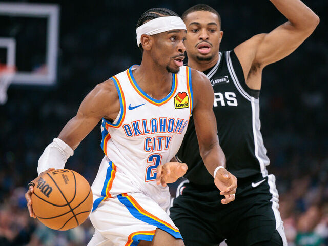 OKLAHOMA CITY, OKLAHOMA - DECEMBER 25: Shai Gilgeous-Alexander #2 of the Oklahoma City Thunder drives to the basket during the first half against the San Antonio Spurs at Paycom Center on December 25, 2025 in Oklahoma City, Oklahoma.
