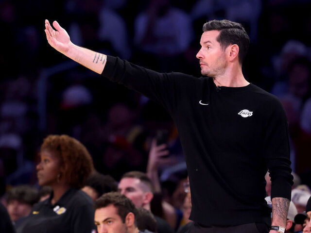 LOS ANGELES, CALIFORNIA - DECEMBER 25: Head coach JJ Redick of the Los Angeles Lakers calls a play during the fourth quarter against the Houston Rockets at Crypto.com Arena on December 25, 2025 in Los Angeles, California.