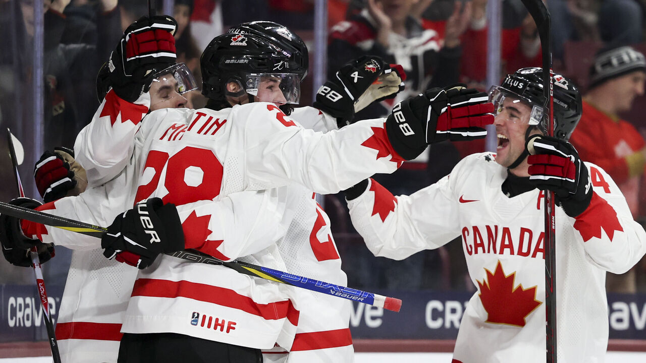 MINNEAPOLIS, MINNESOTA - DECEMBER 26: Canada celebrates after Brady Martin #28 scored a goal in the first period against Czechia at Mariucci Arena on December 26, 2025 in Minneapolis, Minnesota.