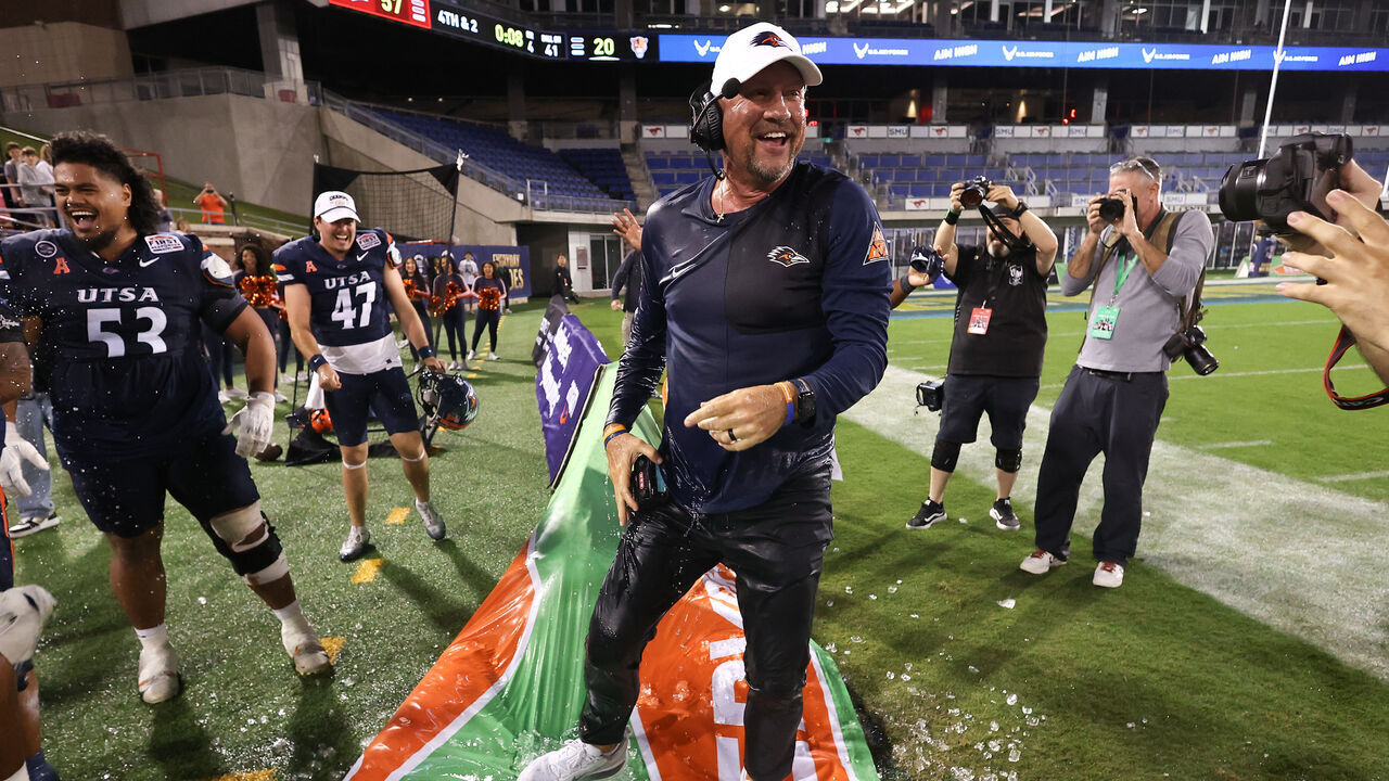 DALLAS, TEXAS - DECEMBER 26: Head coach Jeff Traylor of the UTSA Roadrunners reacts after being doused with water during the fourth quarter in the 2025 SERVPRO First Responder Bowl against the FIU Panthers at Gerald J. Ford Stadium on December 26, 2025 in Dallas, Texas.