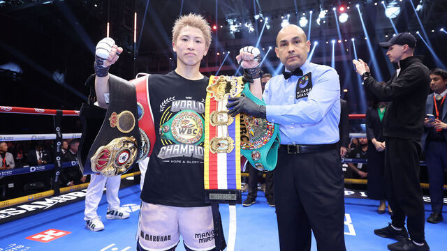 RIYADH, SAUDI ARABIA - DECEMBER 27: Naoya Inoue (pink shorts) celebrates after beating David Picasso in their Undisputed IBF, WBC, WBA and WBO World Super Bantamweight Title fight, during the Ring V: Night Of The Samurai fight night at Mohammed Abdo Arena on December 27, 2025 in Riyadh, Saudi Arabia. .