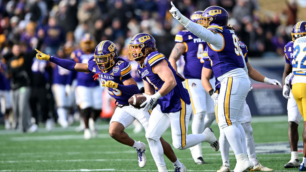 ANNAPOLIS, MARYLAND - DECEMBER 27: Jackson Barker #1 of the East Carolina Pirates celebrates with teammates after recovering a fumble in the second quarter against the Pittsburgh Panthers during the 2025 Go Bowling Military Bowl at Navy-Marine Corps Memorial Stadium on December 27, 2025 in Annapolis, Maryland.