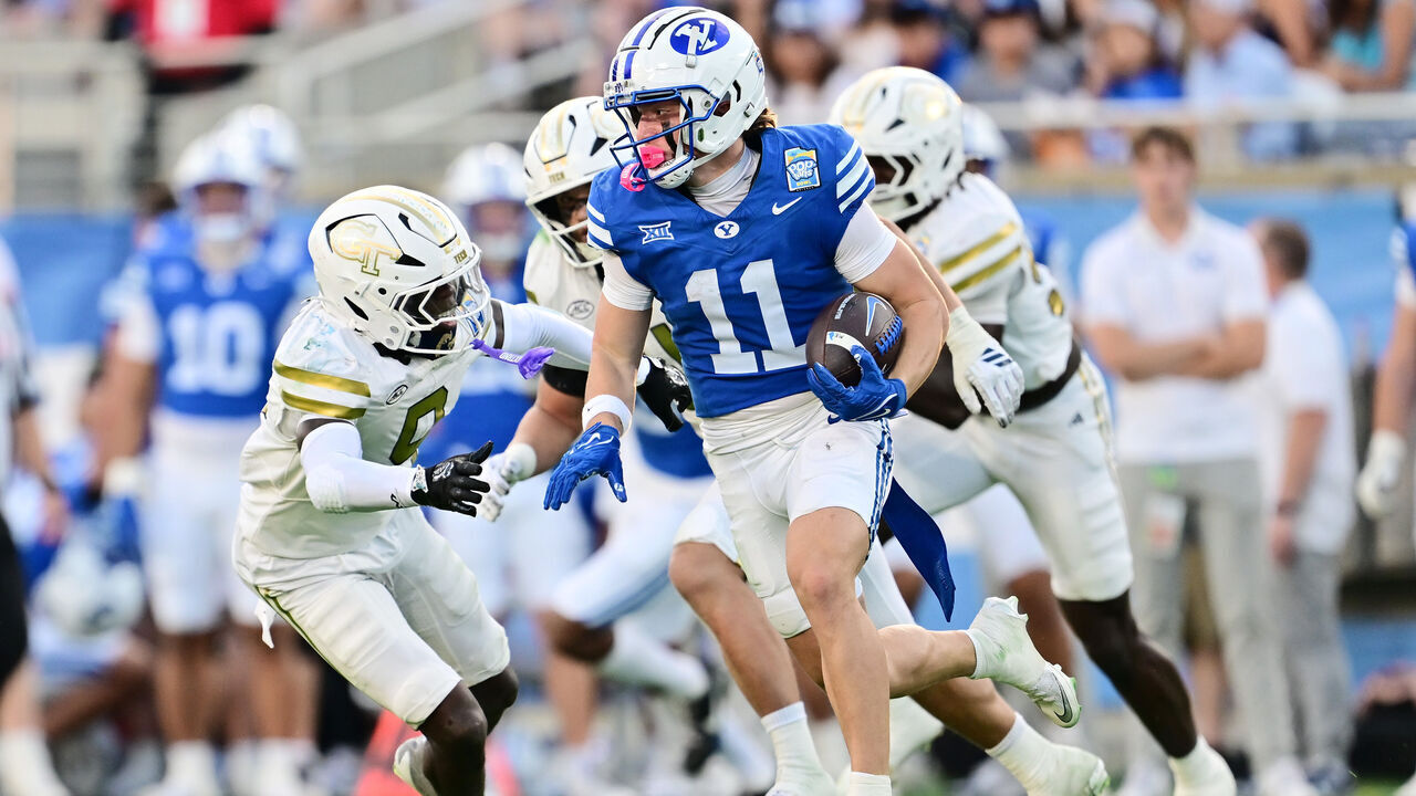 ORLANDO, FLORIDA - DECEMBER 27: Parker Kingston #11 of the BYU Cougars runs with the ball in the first half against the Georgia Tech Yellow Jackets during the 2025 Pop-Tarts Bowl at Camping World Stadium on December 27, 2025 in Orlando, Florida.